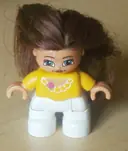 Minifigurka: 47205PB004:  Duplo Figure Lego Ville, Child Girl, White Legs, Orange Top, Brown Hair (Princess)