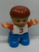 Minifigurka: 47205PB020:  Duplo Figure Lego Ville, Child Boy, Blue Legs, White Top with Red Number 3 Pattern, Dark Red Hair (6013303)