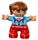 Minifigurka: 47205PB030:  Duplo Figure Lego Ville, Child Girl, Red Legs, Medium Blue Jacket over Shirt with Flower, Reddish Brown Pigtails