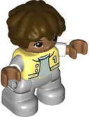 Minifigurka: 47205PB086:  Duplo Figure Lego Ville, Child Boy, Light Bluish Gray Legs, Bright Light Yellow Jacket with Number 1, Dark Brown Hair (6361834)