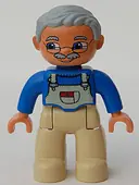 Minifigurka: 47394PB011A:  Duplo Figure Lego Ville, Male, Tan Legs, Blue Top with White Overalls Bib, Light Bluish Gray Hair (4213808)