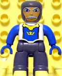 Minifigurka: 47394PB055:  Duplo Figure Lego Ville, Male Castle, Dark Bluish Gray Legs, White Chest, Blue Arms, Blue Hands