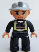 Minifigurka: 47394PB077:  Duplo Figure Lego Ville, Male Fireman, Black Legs, Nougat Hands, Silver Helmet, Blue Eyes (4558027)