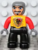 Minifigurka: 47394PB099:  Duplo Figure Lego Ville, Male Castle, Black Legs, Bright Light Orange Chest, Red Arms, Dark Bluish Gray Hands, Wide Crooked Grin (4265815)