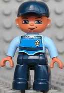 Minifigurka: 47394PB106:  Duplo Figure Lego Ville, Male, Dark Blue Legs, Light Blue Top with Life Jacket and Badge, Dark Blue Cap