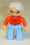 Minifigurka: 47394PB123:  Duplo Figure Lego Ville, Female, Medium Blue Legs, Red Sweater, Very Light Gray Hair, Blue Eyes, Glasses