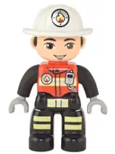 Minifigurka: 47394PB331:  Duplo Figure Lego Ville, Male Firefighter, Black Legs with Reflective Stripes, Red Vest with Silver Fire Badge and Radio, Light Nougat Face, White Helmet with Fire Badge (6374293)