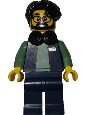 BDP274:  Art Factory Photographer - Male, Dark Blue Bodywarmer Over Sand Green Sweater, Dark Blue Legs, Black Hair Parted on Right, Headphones Around Neck