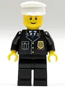 Minifigurka: CTY0005:  Police - City Suit with Blue Tie and Badge, Black Legs, White Hat, Brown Eyebrows, Thin Grin