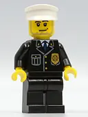 Minifigurka: CTY0099:  Police - City Suit with Blue Tie and Badge, Black Legs, White Hat, Smirk and Stubble Beard