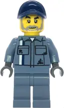 Minifigurka: CTY1857:  Scrapyard Worker - Male, Sand Blue Mechanic Uniform, Sand Blue Legs, Dark Blue Cap, Beard