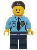 Minifigurka: TWN220:  Police - Female Officer, Dark Brown Hair with Bun