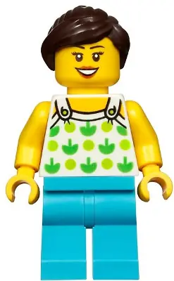 TWN367:  Female, White Halter Top with Green Apples and Lime Spots, Medium Azure Legs, Dark Brown Ponytail