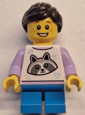 TWN498:  Child - Girl, White Top with Raccoon, Dark Azure Short Legs, Dark Brown Hair Ponytail, Freckles