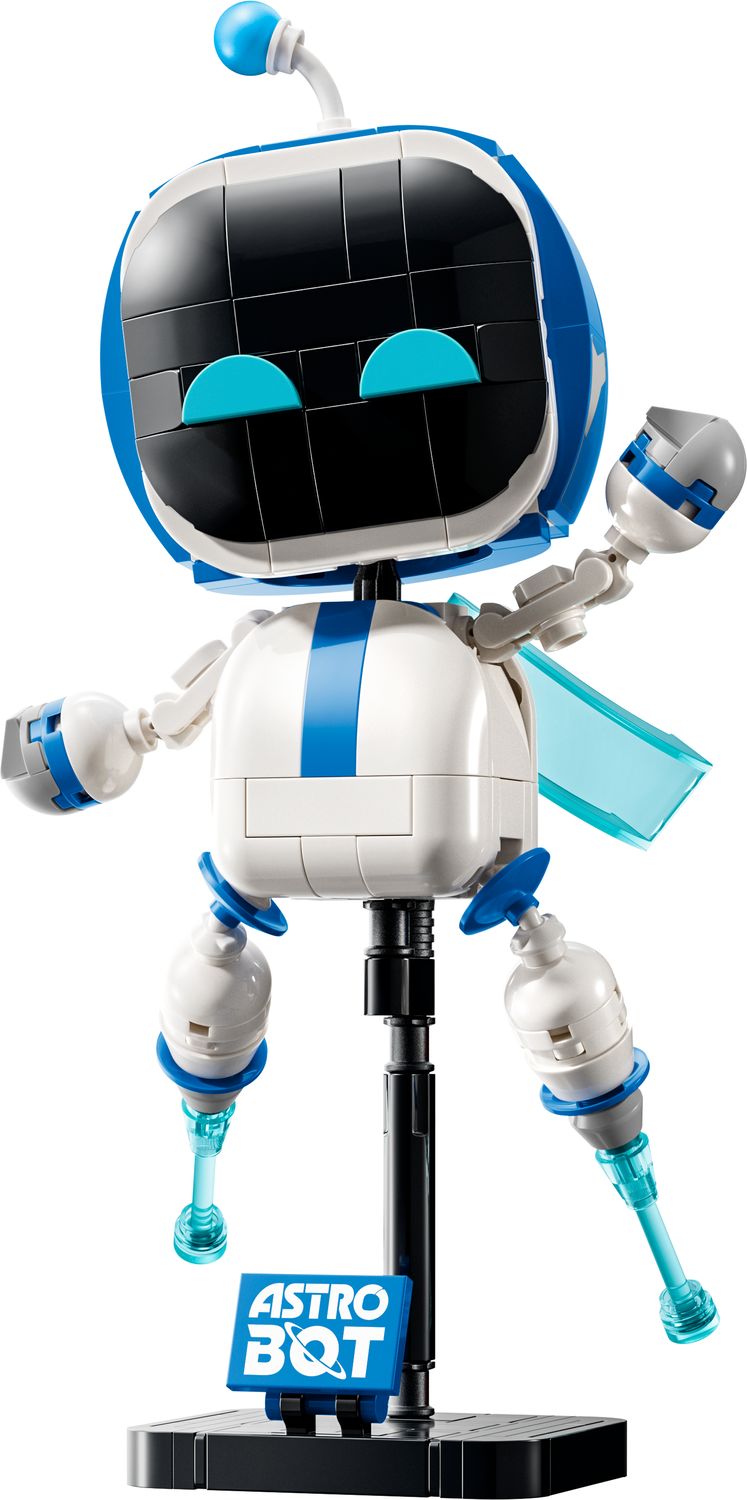 Zbudowana z klocków figurka Astro Bota z zestawu LEGO 40899 z peleryną i niebieskimi silnikami odrzutowymi na podstawce